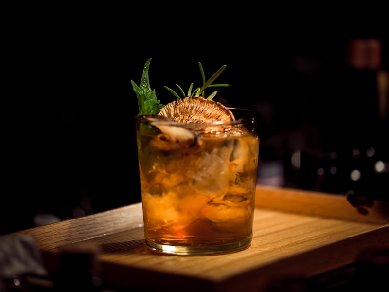 Craft cocktail with atmospheric bar lighting